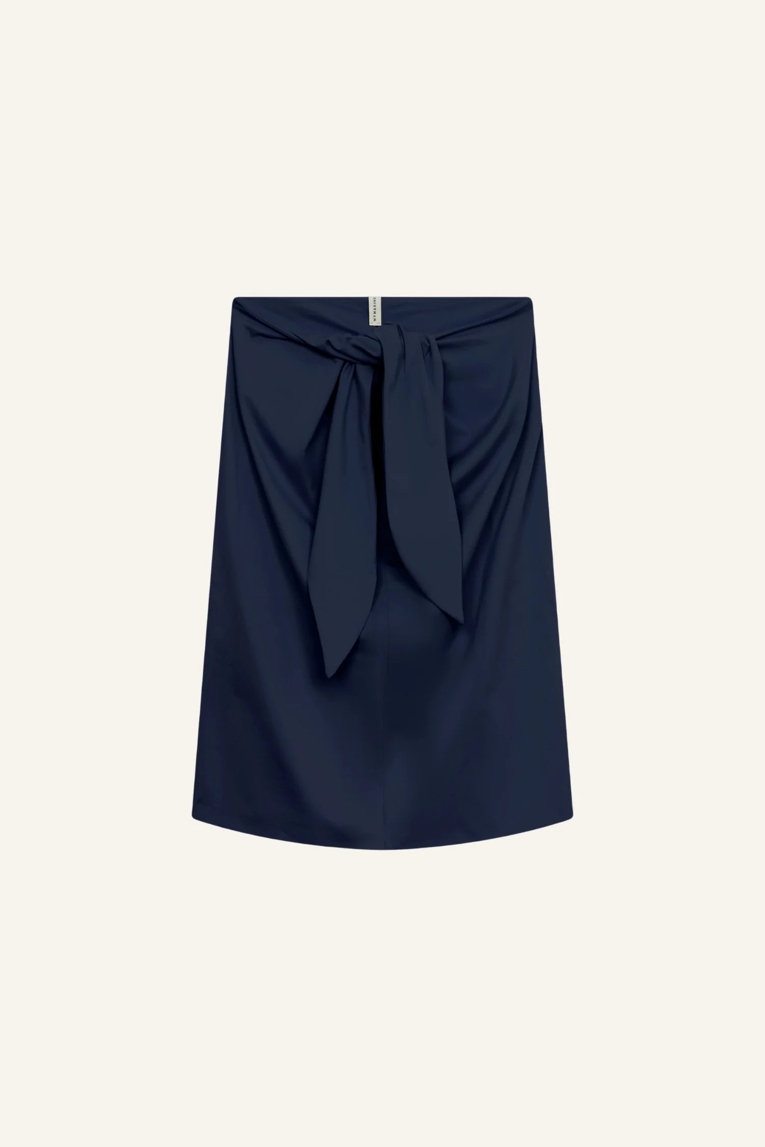 Dunkelblauer MYMARINI-Rock mit Knoten-Detail vorne, vor hellem Hintergrund.#color_navy