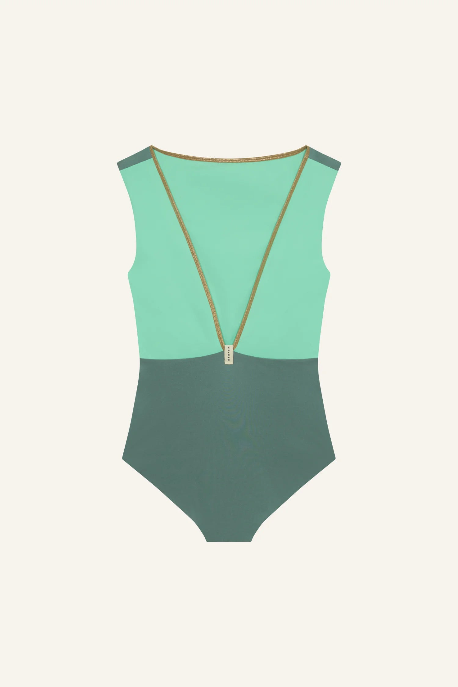 MYMARINI Badeanzug in Grün mit hohem Beinausschnitt und tiefem Rückenausschnitt, schlichtes Design auf hellem Hintergrund.#color_lagoon-teal