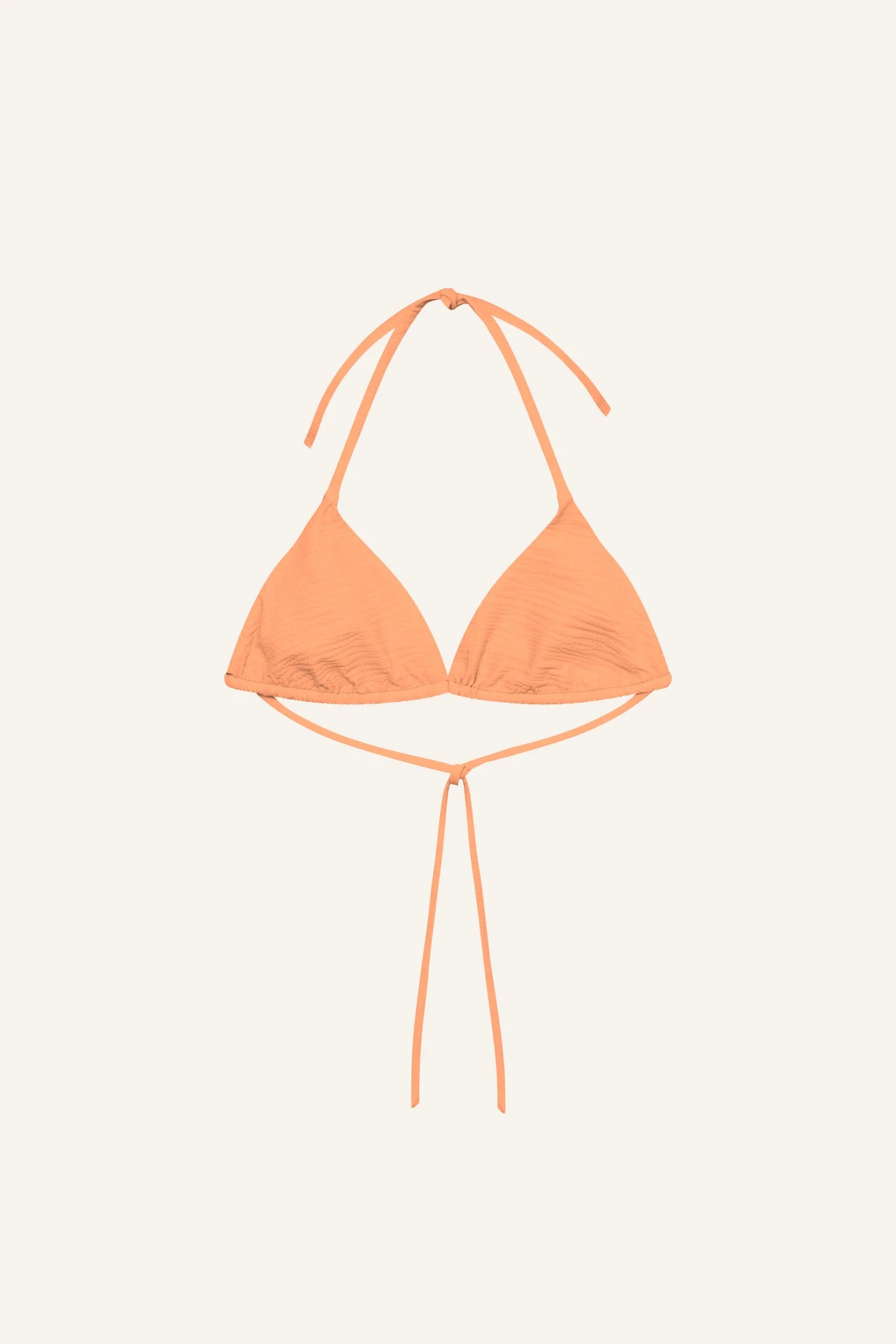 Orangefarbenes MYMARINI Bikinitop mit Neckholder und schmalen Trägern vor hellem Hintergrund.#color_marshmallow-peach