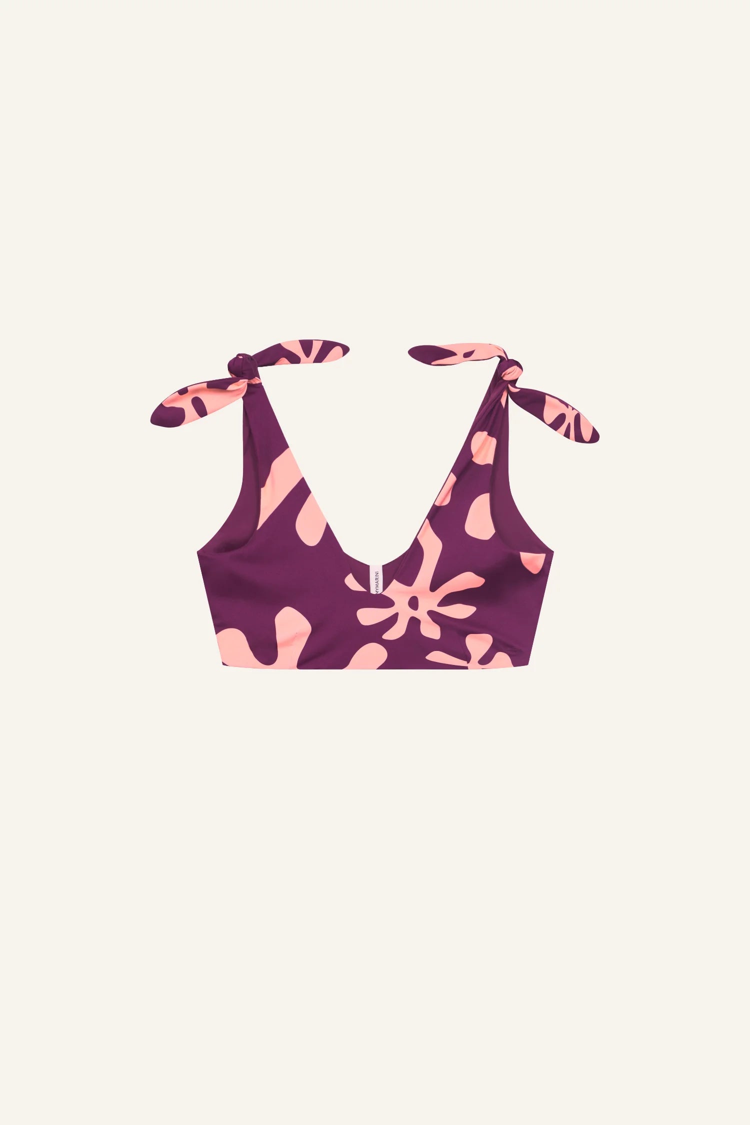 MYMARINI Bikinitop mit V-Ausschnitt und breiten Trägern, lila mit rosa Muster, vor hellem Hintergrund.#color_berry-print
