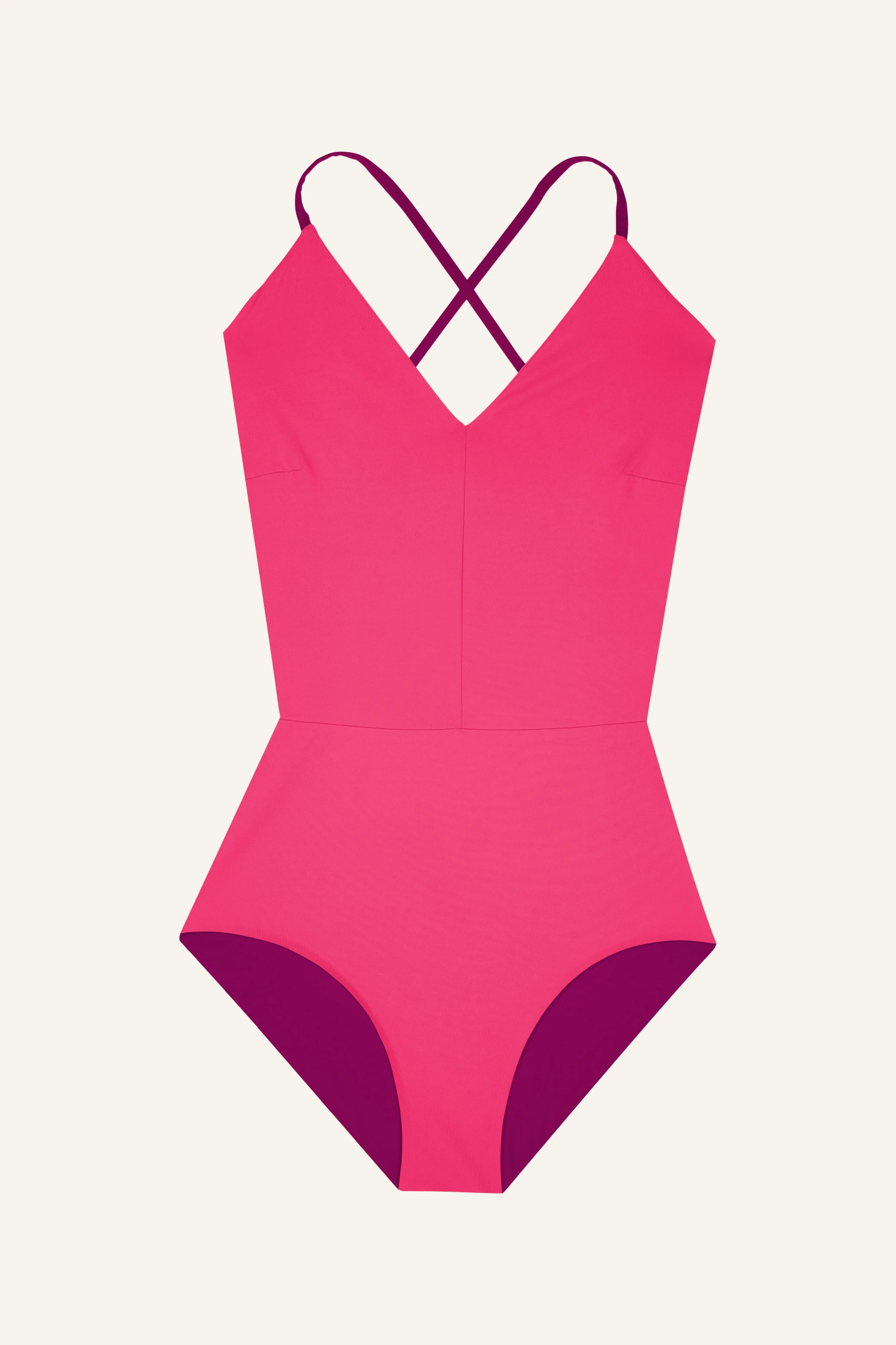 MYMARINI One-Piece in Pink mit V-Ausschnitt und Cross-Top-Trägern auf hellem Hintergrund.#color_pink-hortensia