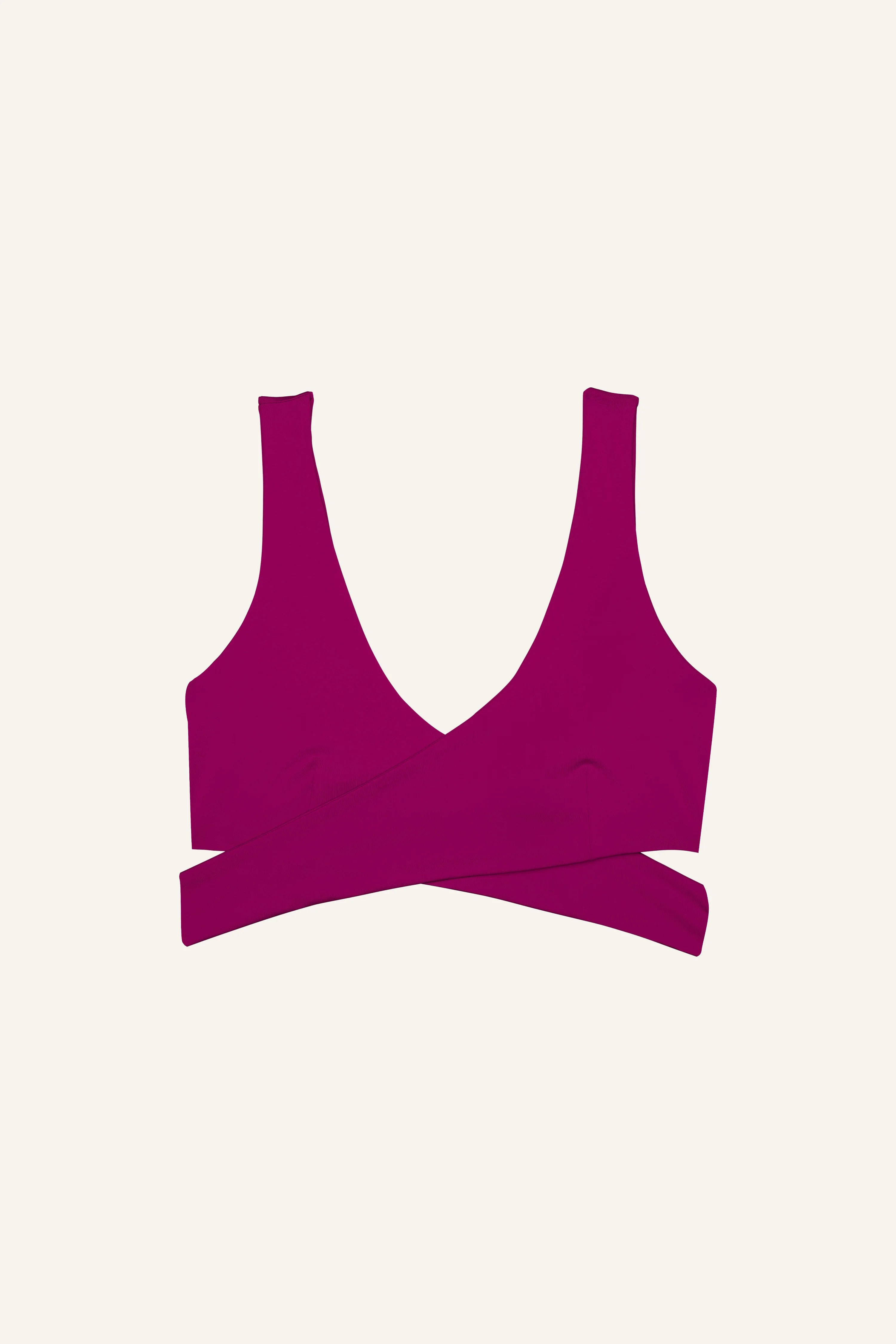 MYMARINI Bikinitop in kräftigem Pink mit V-Ausschnitt und breiten Trägern vor hellem Hintergrund.#color_pink-hortensia