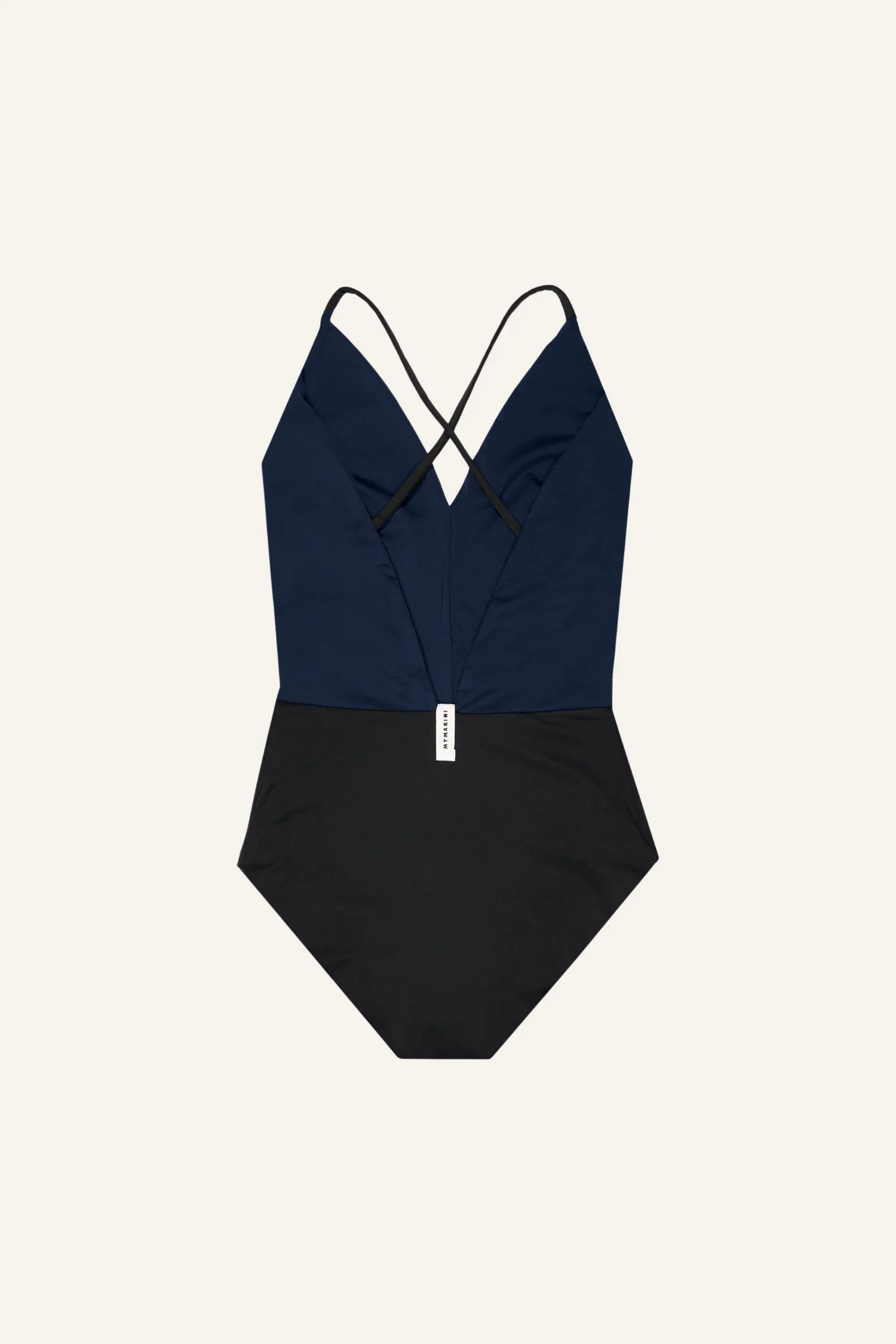 MYMARINI One-Piece mit V-Ausschnitt und Spaghettiträgern in Dunkelblau und Schwarz auf hellem Hintergrund.#color_black-navy