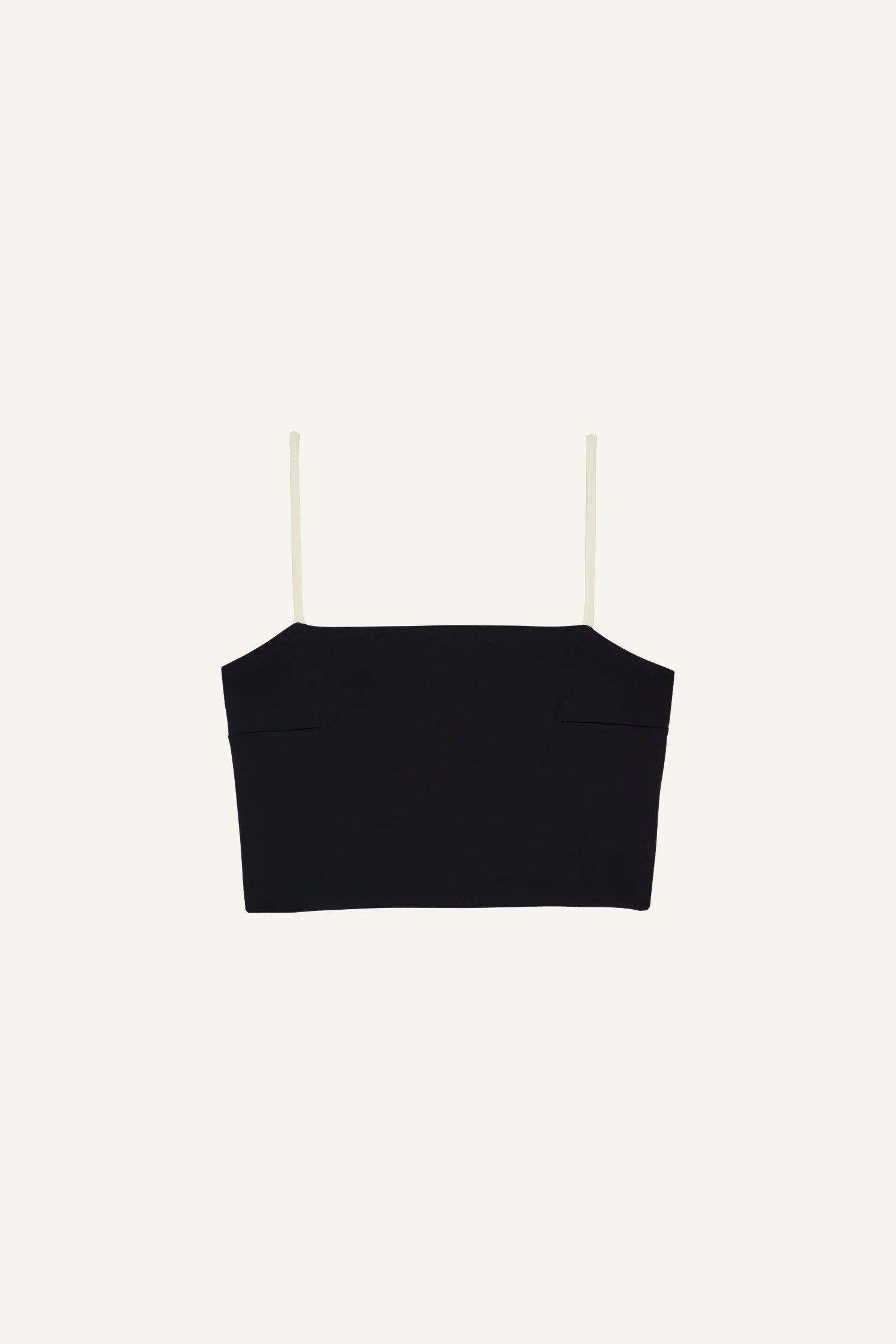 Schwarzes MYMARINI Bikinitop mit Spaghettiträgern auf hellem Hintergrund.#color_black-grey-white