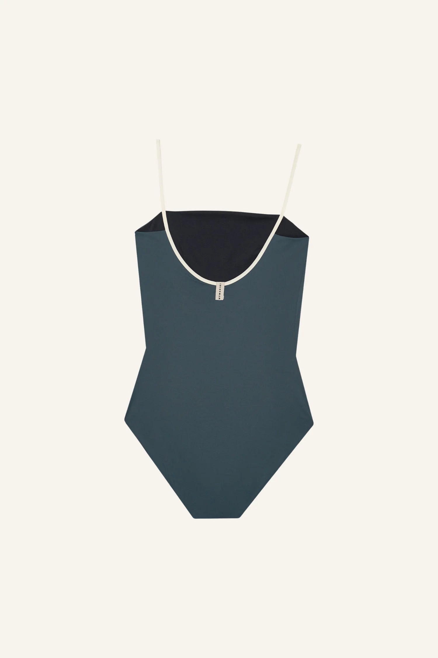 MYMARINI One-Piece Badeanzug in Dunkelblau mit Spaghettiträgern und hohem Beinausschnitt vor hellem Hintergrund.#color_black-grey-white