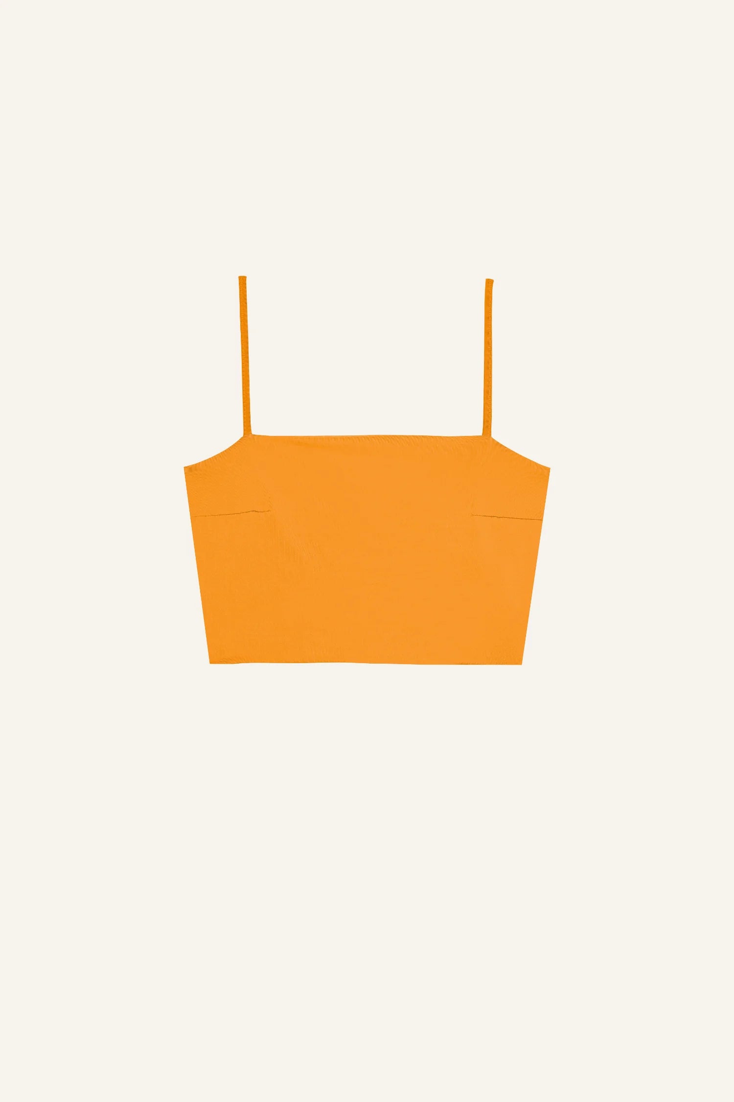 MYMARINI Bikinitop in leuchtendem Orange mit Spaghettiträgern vor hellem Hintergrund.#color_buttermilk-soleil