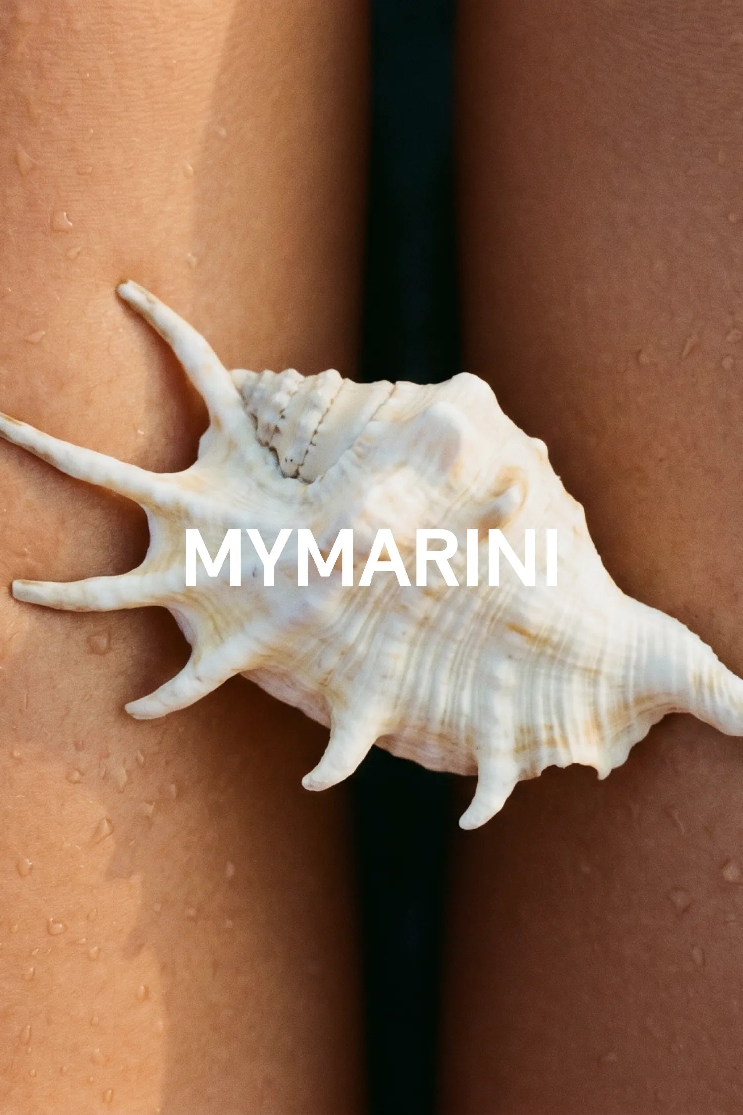 AI-generated, pale spiral sea shell resting on wet, tanned legs, MYMARINI wordmark