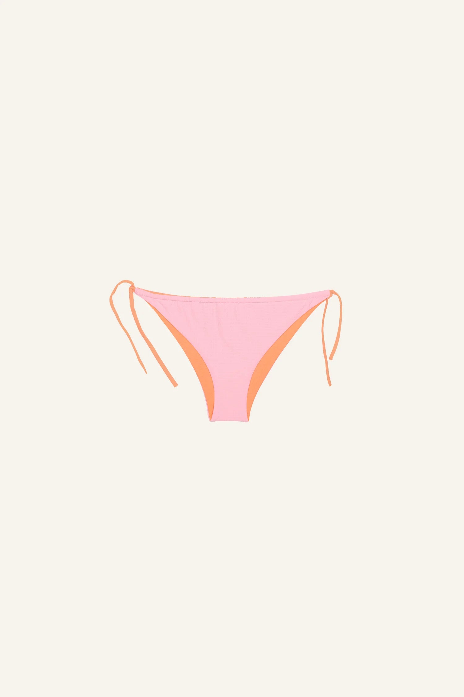 MYMARINI Bikinihose in Rosa und Orange mit seitlichen Bindebändern, Low rise Schnitt, auf hellem Hintergrund.#color_marshmallow-peach