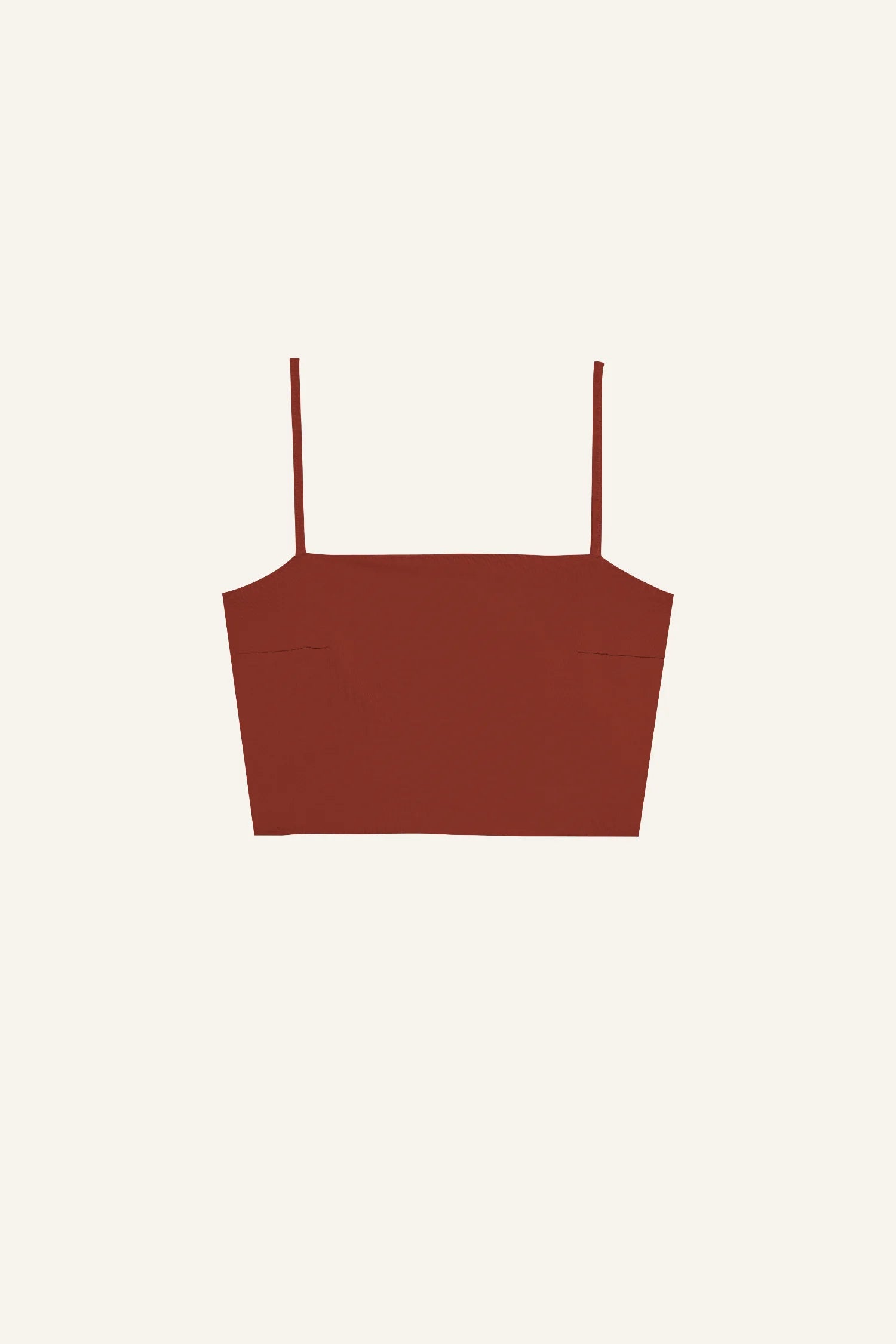 Rotes Bikinitop von MYMARINI mit Spaghettiträgern vor hellem Hintergrund.#color_sienna-orchid