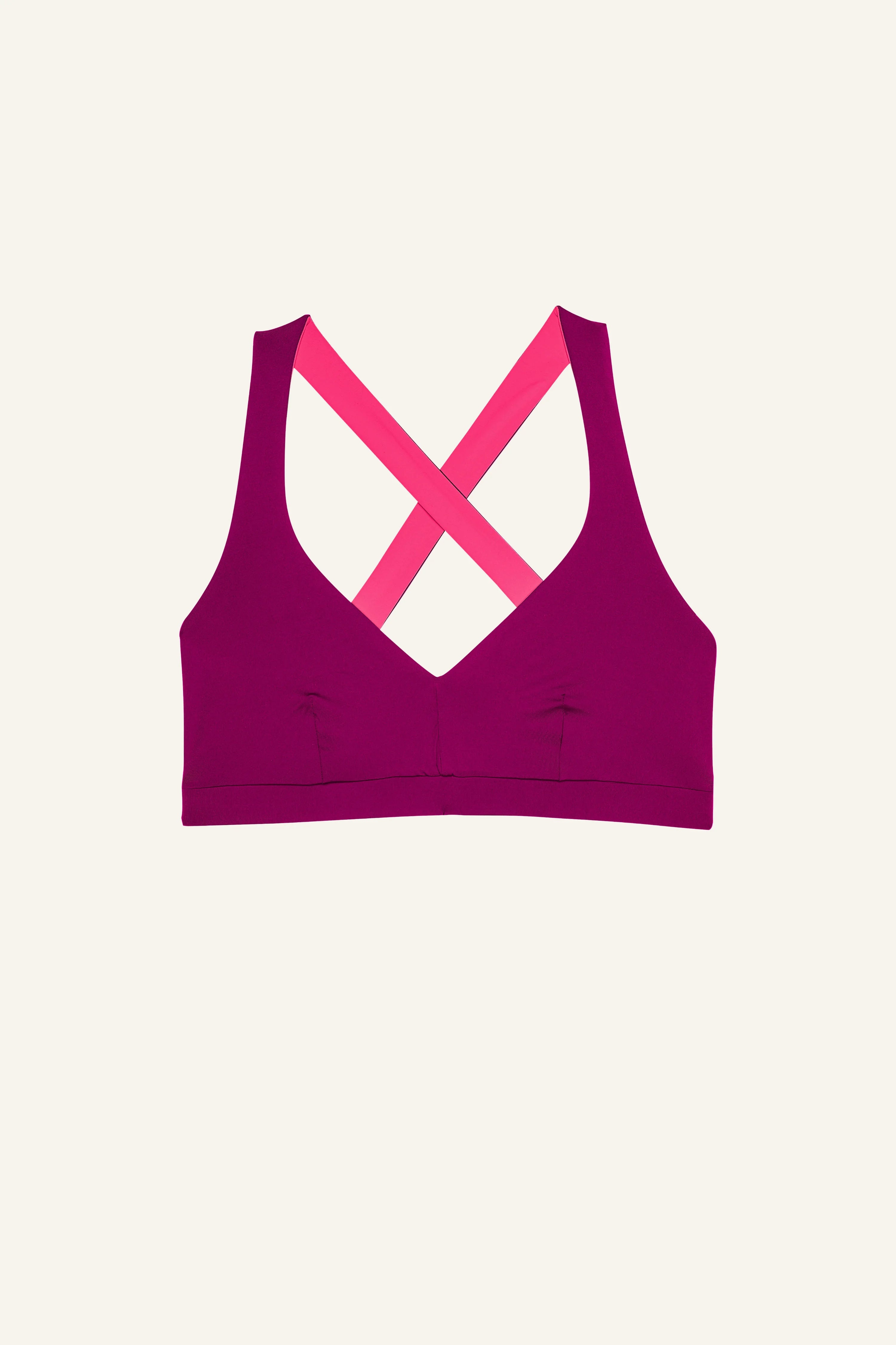 MYMARINI Bikinitop in Lila mit V-Ausschnitt und pinken Cross-Trägern auf hellem Hintergrund.#color_pink-hortensia