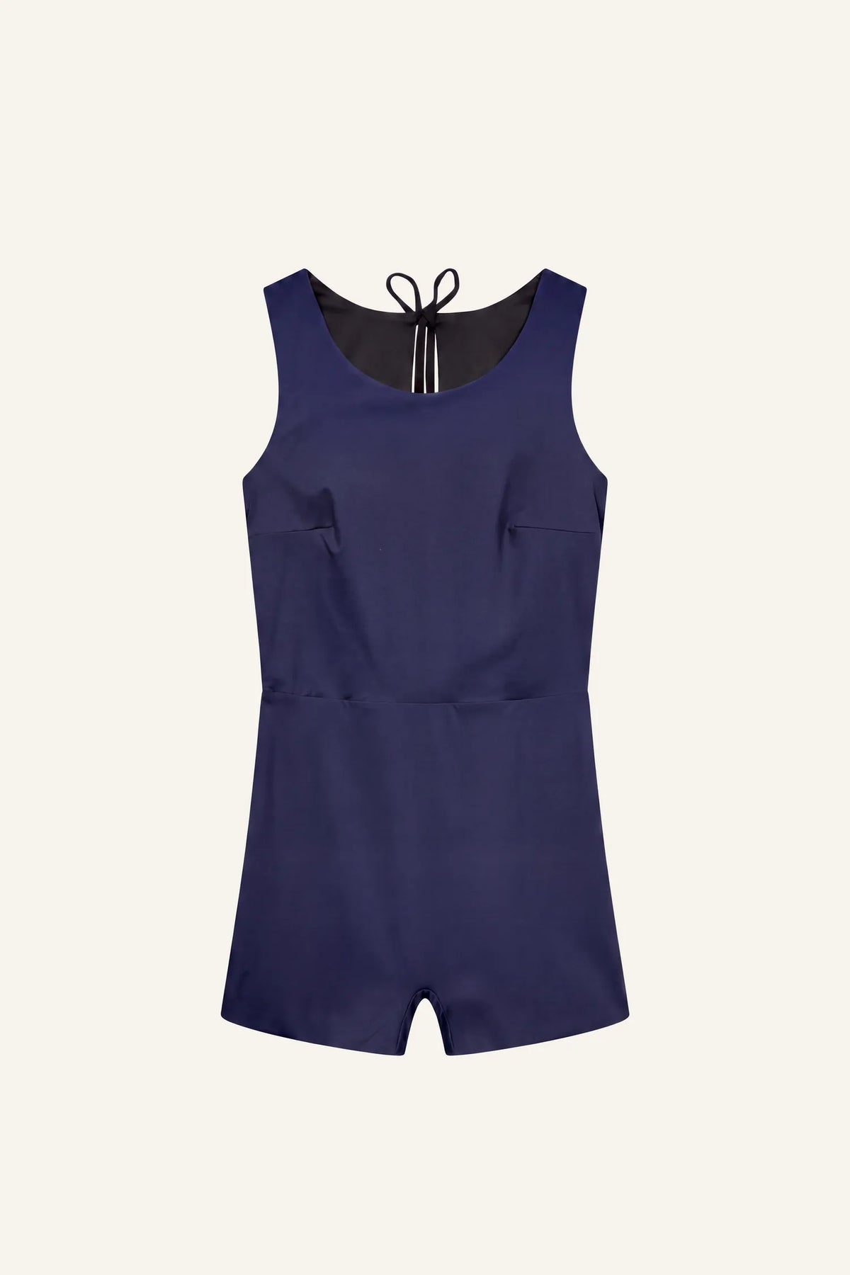 MYMARINI SHORTIE swimsuit in navy with wide straps, short legs, and a neck tie, black lining visible#color_black-navy